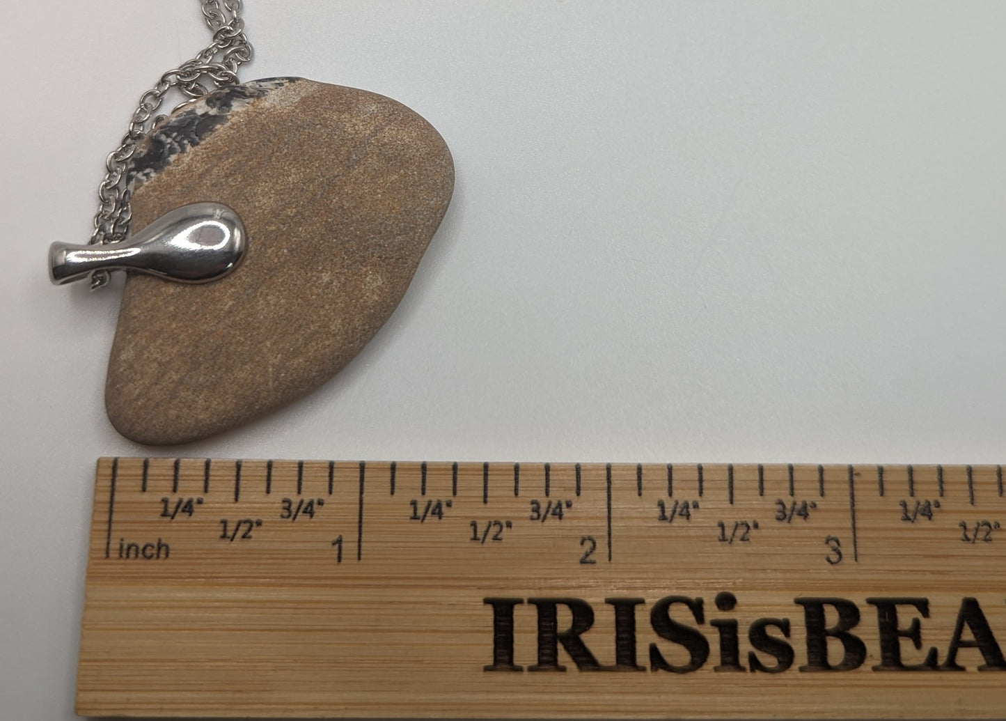 Maine beach stone pendant, multi color stone with black tone stripe, Maine beach stone necklace