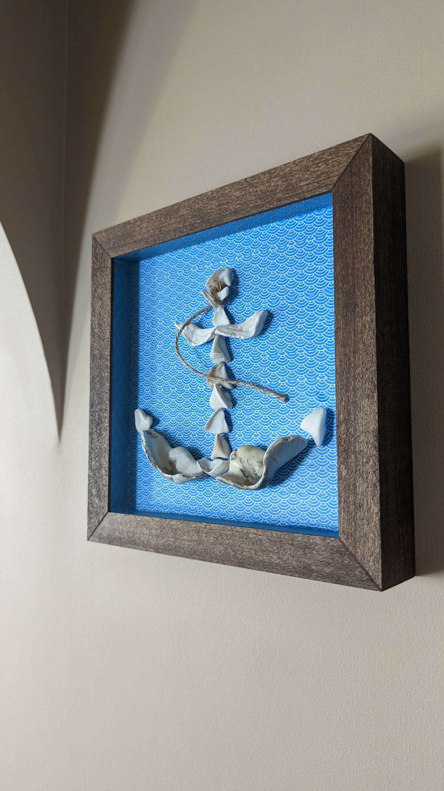 Framed art, anchor made from clamshell pieces and Washi Tape
