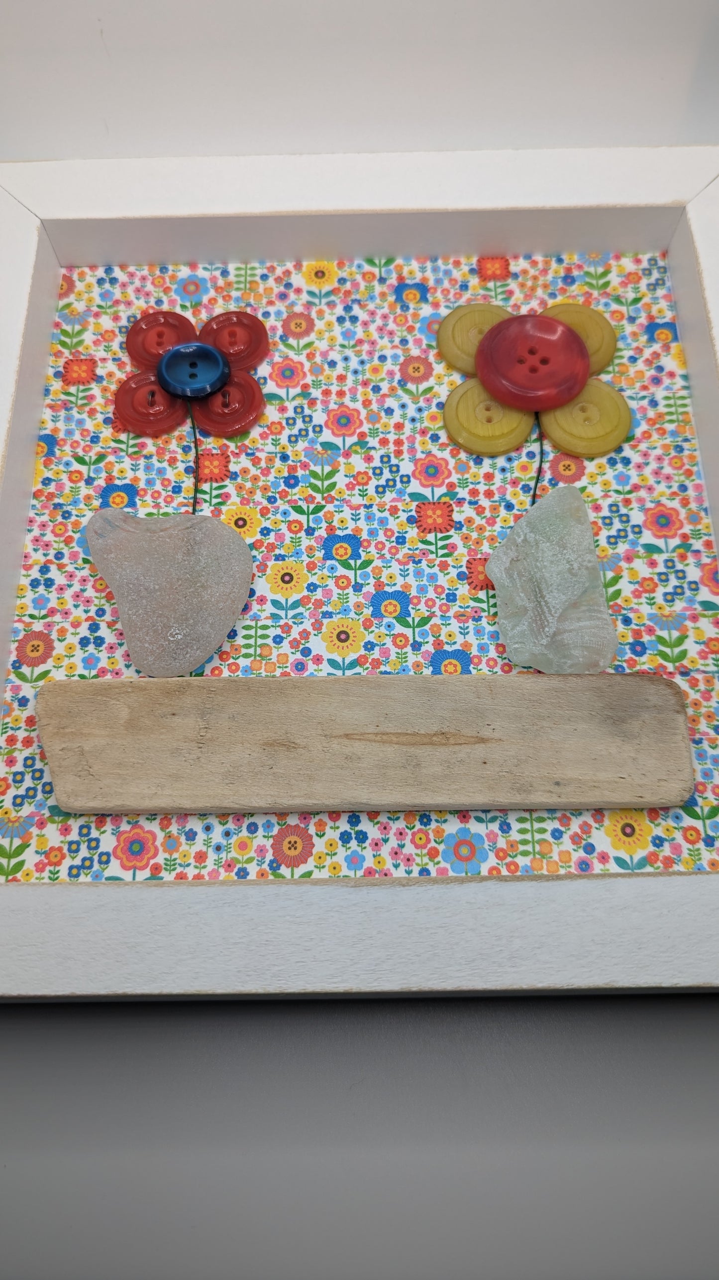 Mixed media framed flowers, vintage buttons, seaglass, driftwood and Washi Tape in 8 x 8 inch shadow box